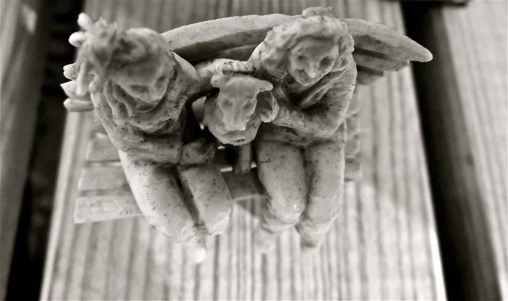 Family on a bench, from above, black and white